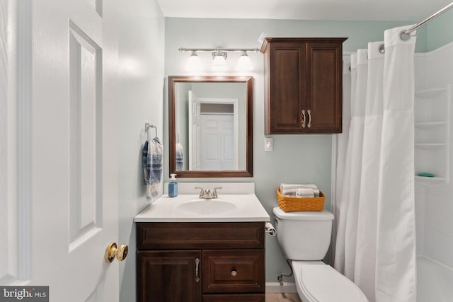 8807 Falkstone Ln, Alexandria, VA 22309 - bathroom with curtained shower, vanity, and toilet