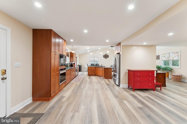 8807 Falkstone Ln, Alexandria, VA 22309 - kitchen with a sink, recessed lighting, light wood-style flooring, baseboards, and appliances with stainless steel finishes