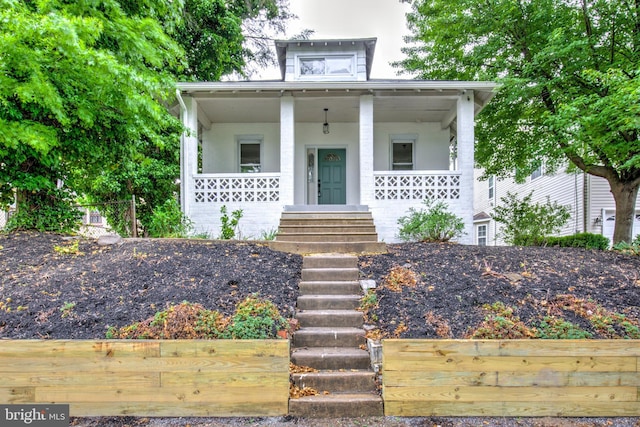 615 Burke Ave, Jenkintown, PA 19046 - view of front of house with fence, a porch, stucco siding, and stairs
