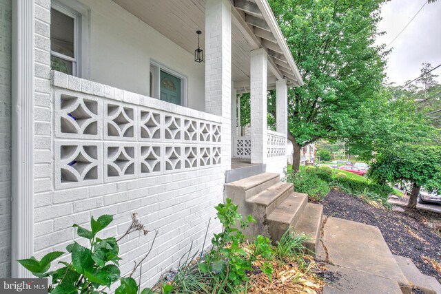 615 Burke Ave, Jenkintown, PA 19046 - view of side of home featuring a porch and brick siding