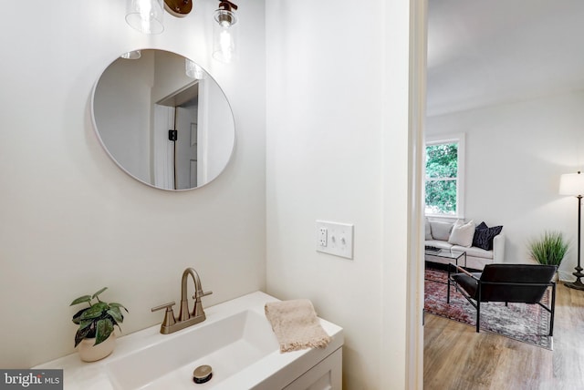 615 Burke Ave, Jenkintown, PA 19046 - bathroom with wood finished floors and vanity