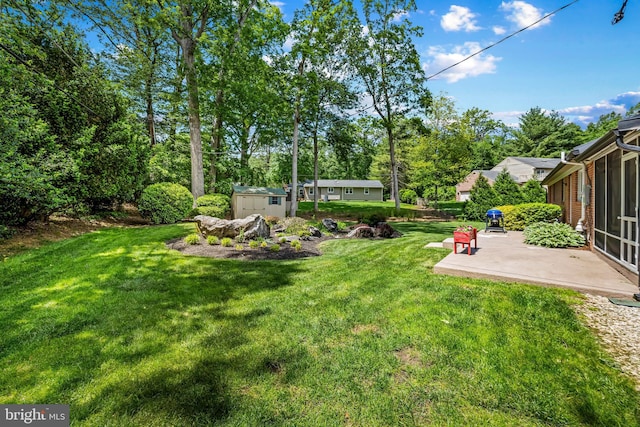 1902 Northleigh Rd, Lutherville Timonium, MD 21093 - view of green lawn featuring a patio area and view of wooded area