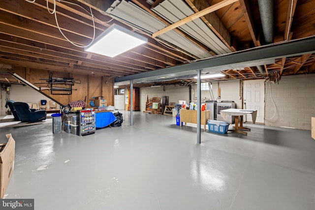 1902 Northleigh Rd, Lutherville Timonium, MD 21093 - unfinished basement featuring washing machine and clothes dryer