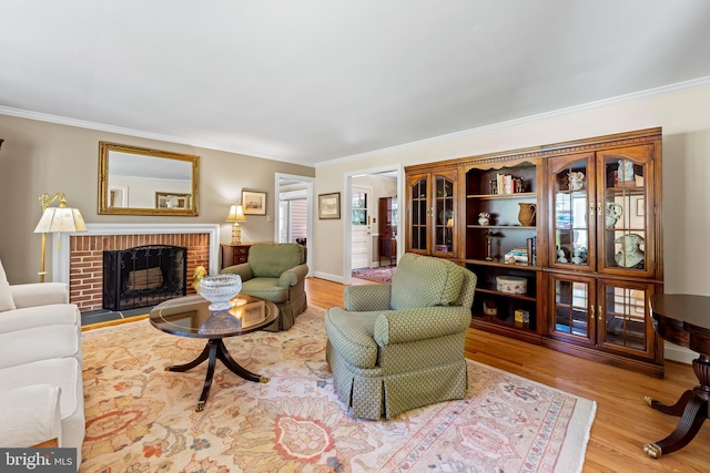 1902 Northleigh Rd, Lutherville Timonium, MD 21093 - living area with crown molding, wood finished floors, a fireplace, and baseboards