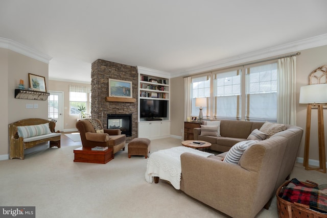 carpeted living room with crown molding, a stone fireplace, built in features, and baseboards