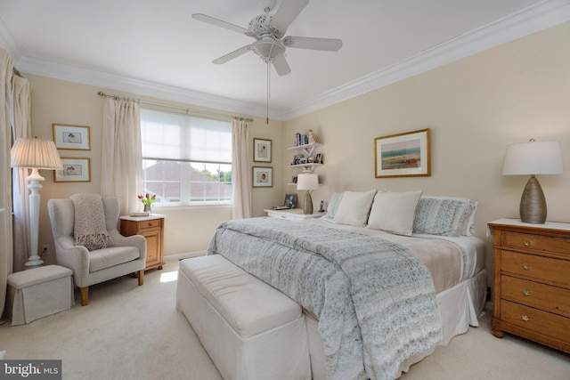 bedroom with light colored carpet, baseboards, crown molding, and ceiling fan