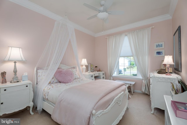 bedroom featuring light colored carpet, ornamental molding, baseboards, and a ceiling fan