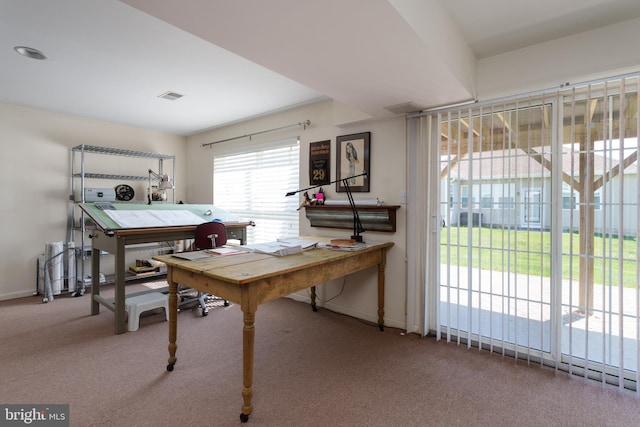 home office with carpet flooring, baseboards, and visible vents