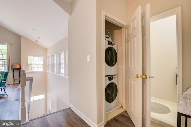 11405 Windleaf Ct Unit K # 24, Reston, VA 20194 - laundry area with stacked washer and dryer, wood finished floors, laundry area, and baseboards