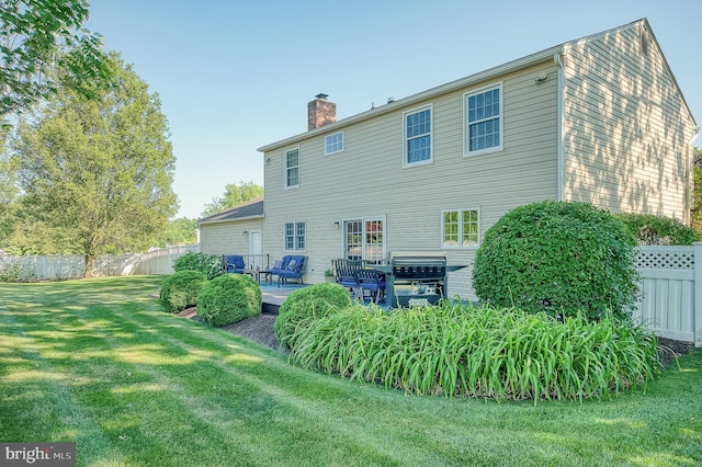 1400 Midhurst Ct, Bel Air, MD 21014 - rear view of house with a chimney and a deck