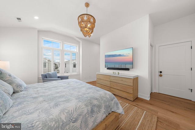 15 W Harding Ave, Long Beach Township, NJ 08008 - bedroom featuring light wood-style flooring, a chandelier, baseboards, vaulted ceiling, and recessed lighting