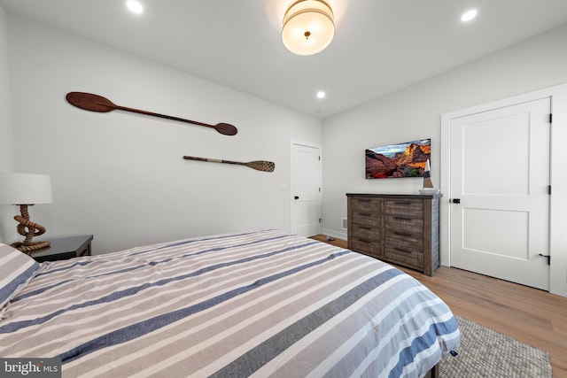15 W Harding Ave, Long Beach Township, NJ 08008 - bedroom with light wood finished floors, recessed lighting, and vaulted ceiling