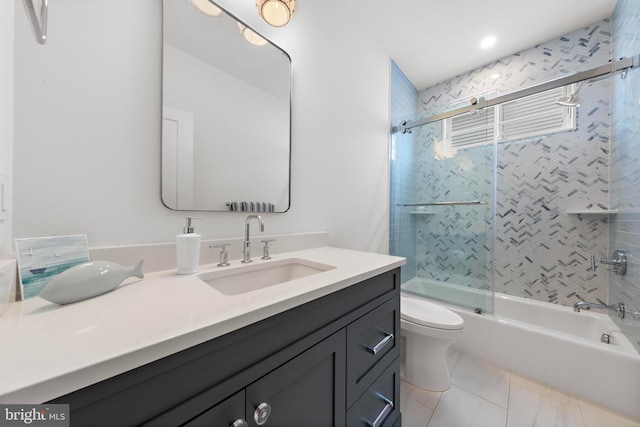 15 W Harding Ave, Long Beach Township, NJ 08008 - bathroom featuring toilet, bath / shower combo with glass door, and vanity