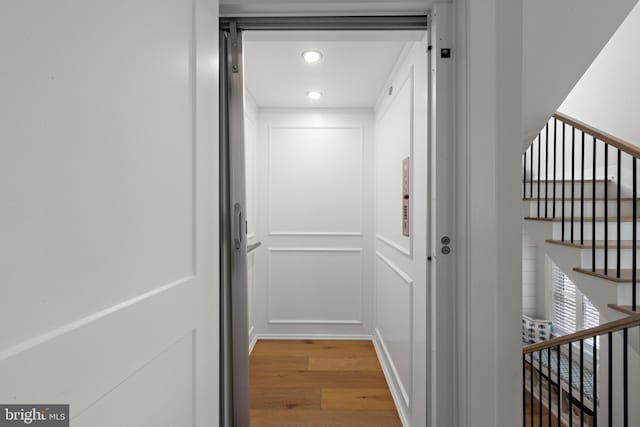 15 W Harding Ave, Long Beach Township, NJ 08008 - hallway with elevator, light wood finished floors, and recessed lighting
