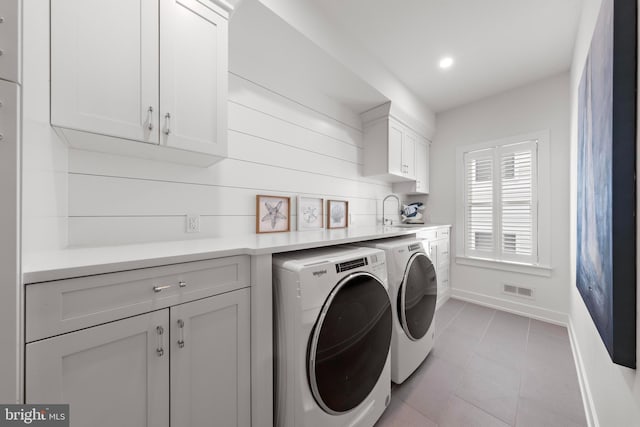 15 W Harding Ave, Long Beach Township, NJ 08008 - washroom with washing machine and clothes dryer, baseboards, cabinet space, light tile patterned floors, and recessed lighting