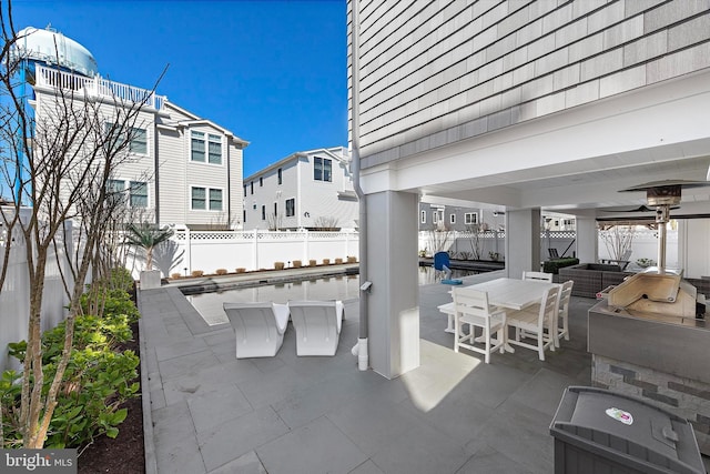 15 W Harding Ave, Long Beach Township, NJ 08008 - view of patio / terrace with a fenced backyard and outdoor dining area