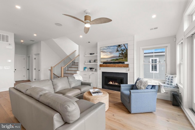 15 W Harding Ave, Long Beach Township, NJ 08008 - living room featuring light wood-style flooring, stairs, a large fireplace, a ceiling fan, and recessed lighting
