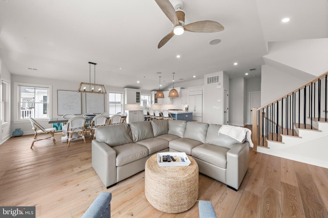 15 W Harding Ave, Long Beach Township, NJ 08008 - living area featuring light wood-style floors, ceiling fan, recessed lighting, stairs, and baseboards