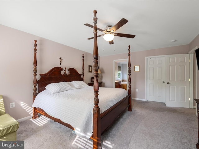 carpeted bedroom featuring ceiling fan, baseboards, and a closet
