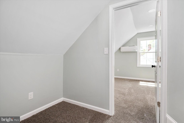 bonus room featuring carpet flooring, vaulted ceiling, baseboards, and an AC wall unit