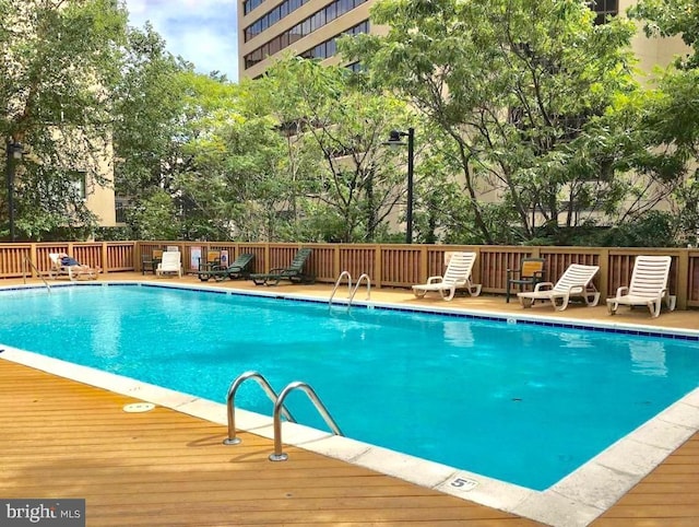 community pool featuring a deck