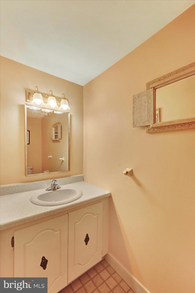 114 Dew Drop Ct, York, PA 17403 - bathroom with vanity, tile patterned floors, and baseboards