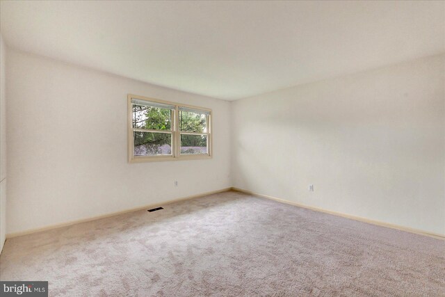 114 Dew Drop Ct, York, PA 17403 - carpeted empty room featuring baseboards