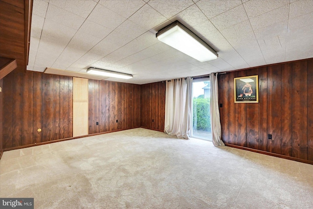 114 Dew Drop Ct, York, PA 17403 - carpeted empty room with wood walls