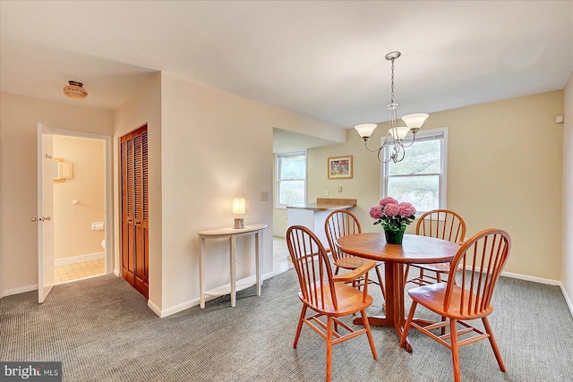 114 Dew Drop Ct, York, PA 17403 - carpeted dining room with healthy amount of natural light, a chandelier, and baseboards