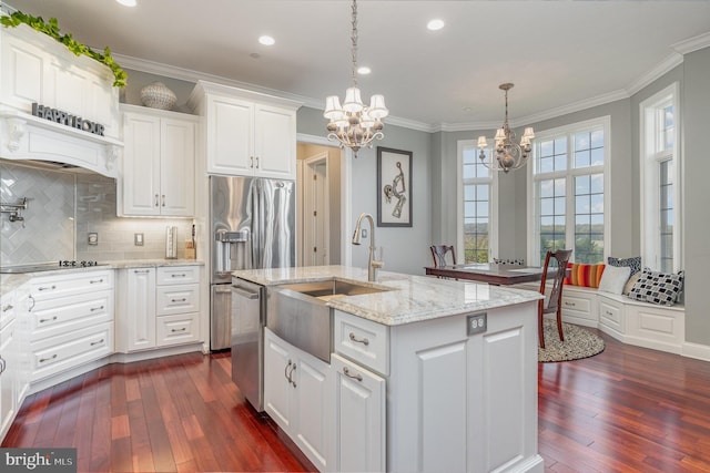 890 Hobart Rd, Hanover, PA 17331 - kitchen with a chandelier, a sink, appliances with stainless steel finishes, dark wood-type flooring, and crown molding