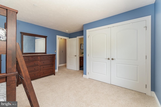 890 Hobart Rd, Hanover, PA 17331 - bedroom featuring light colored carpet, baseboards, and a closet