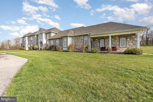 890 Hobart Rd, Hanover, PA 17331 - view of front of property featuring stone siding, a front lawn, and roof with shingles