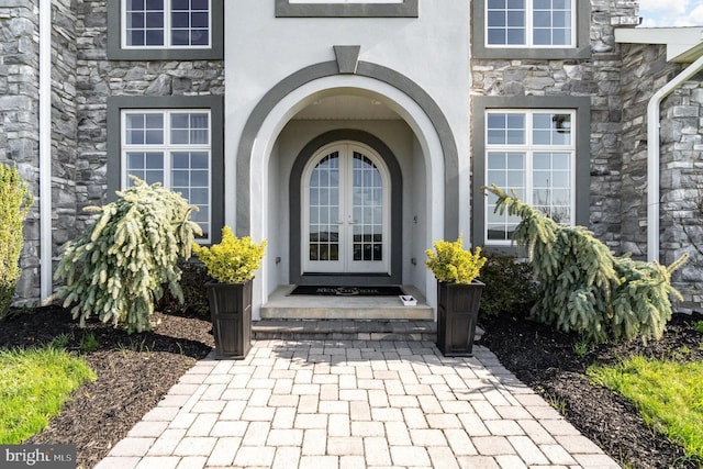 890 Hobart Rd, Hanover, PA 17331 - property entrance featuring french doors, stone siding, and stucco siding