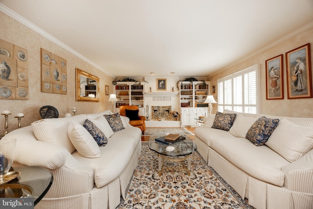 living room featuring a fireplace and crown molding