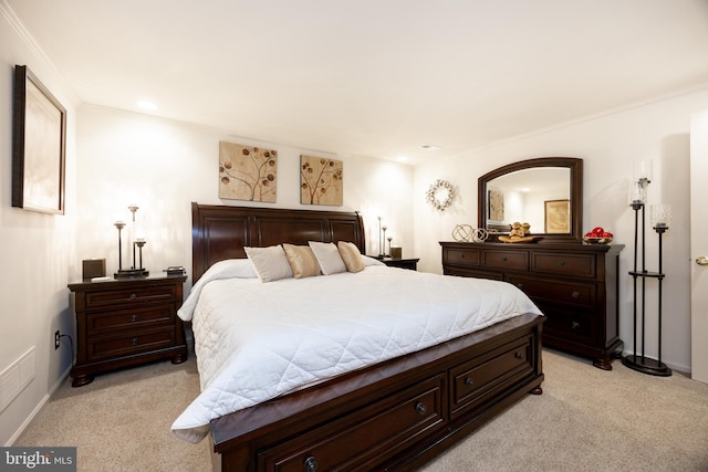 bedroom with recessed lighting, ornamental molding, baseboards, and light carpet