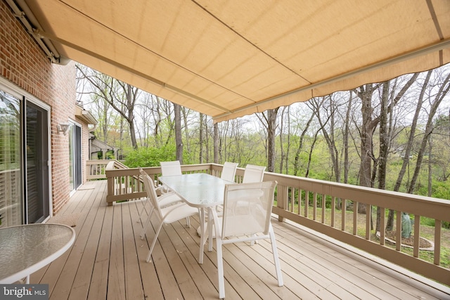 deck with outdoor dining space