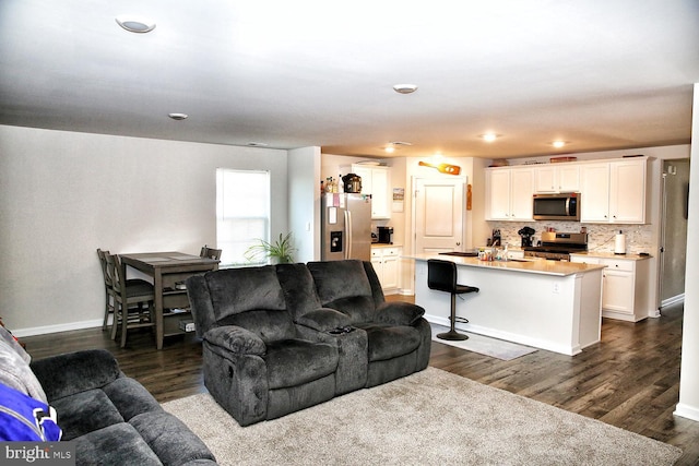 185 Petal Dr, Pottstown, PA 19464 - living room with recessed lighting, dark wood finished floors, and baseboards