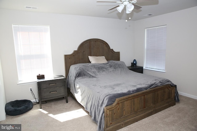 185 Petal Dr, Pottstown, PA 19464 - bedroom with visible vents, a ceiling fan, baseboards, and light carpet