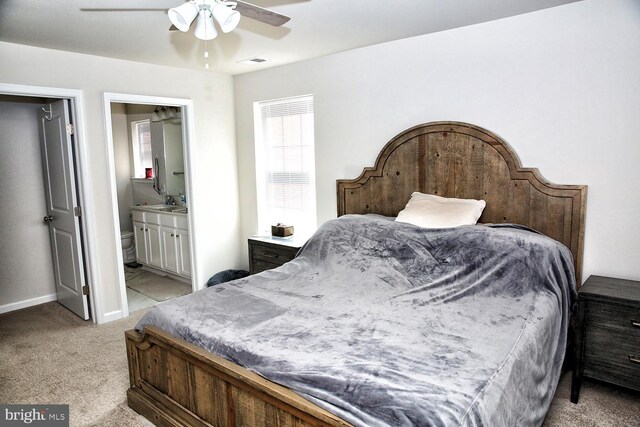185 Petal Dr, Pottstown, PA 19464 - bedroom featuring visible vents, a ceiling fan, baseboards, light colored carpet, and ensuite bathroom