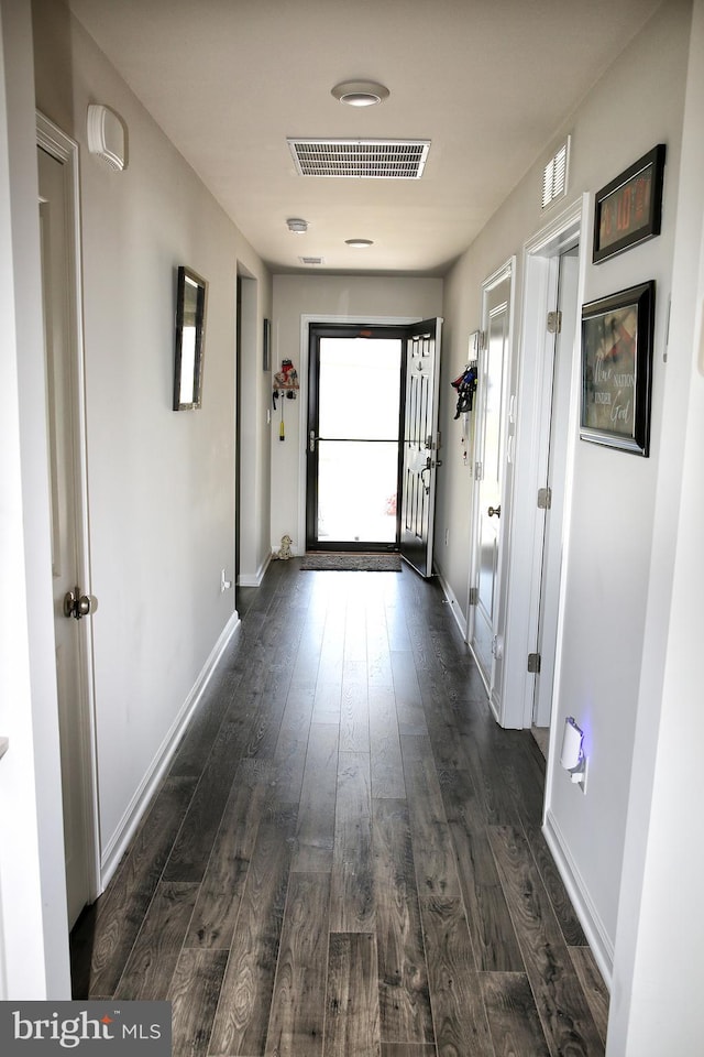 185 Petal Dr, Pottstown, PA 19464 - hallway featuring baseboards, dark wood-type flooring, and visible vents
