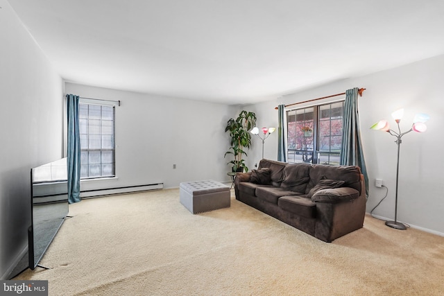 living room with baseboards and carpet