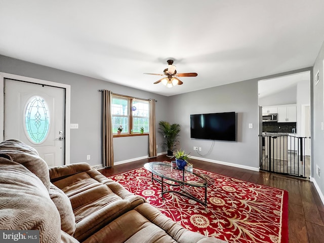 353 Kerrsville Rd, Carlisle, PA 17015 - living area featuring baseboards, ceiling fan, and dark wood-style flooring