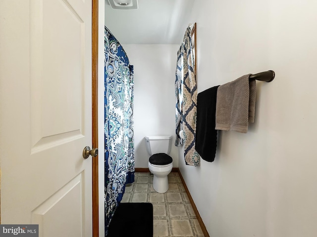 353 Kerrsville Rd, Carlisle, PA 17015 - bathroom featuring toilet and baseboards