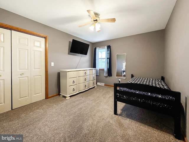 353 Kerrsville Rd, Carlisle, PA 17015 - carpeted bedroom with a closet, baseboards, ceiling fan, and visible vents