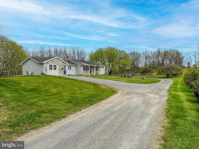 353 Kerrsville Rd, Carlisle, PA 17015 - ranch-style house with a front lawn and curved driveway