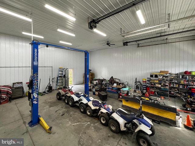 353 Kerrsville Rd, Carlisle, PA 17015 - garage featuring metal wall and a garage door opener