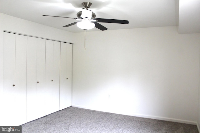 1105 Castle Harbour Way Unit 2B, Glen Burnie, MD 21060 - unfurnished bedroom featuring ceiling fan, baseboards, carpet flooring, and a closet