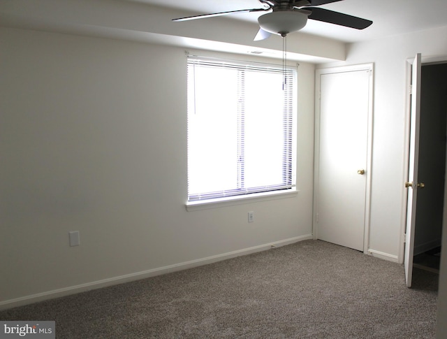 1105 Castle Harbour Way Unit 2B, Glen Burnie, MD 21060 - unfurnished bedroom featuring baseboards, a ceiling fan, and carpet flooring
