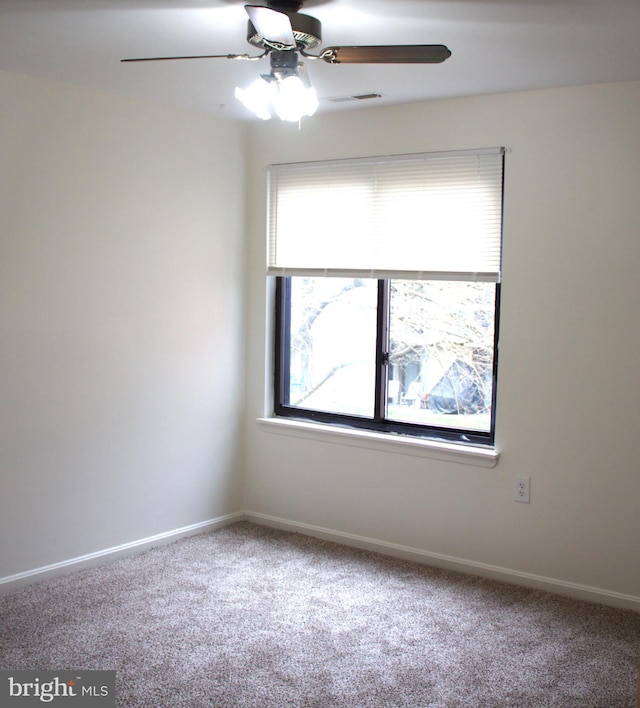 1105 Castle Harbour Way Unit 2B, Glen Burnie, MD 21060 - empty room with baseboards, a ceiling fan, visible vents, and carpet