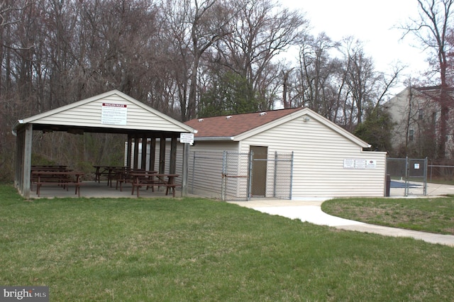 1105 Castle Harbour Way Unit 2B, Glen Burnie, MD 21060 - view of outdoor structure with fence, a gazebo, and a gate